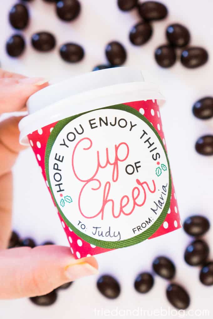 Hand holding the Mini Coffee Cup Christmas Gift.