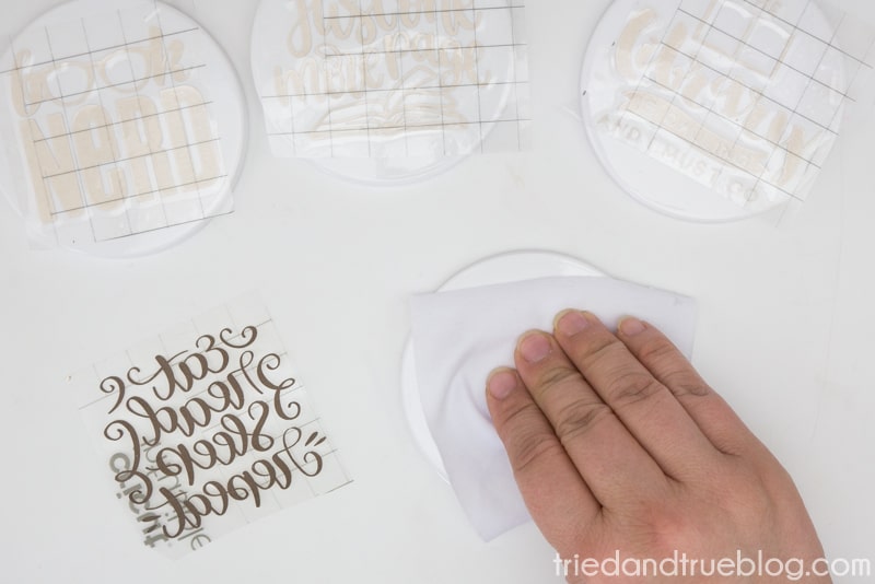 Cleaning ceramic coaster with microfiber cloth
