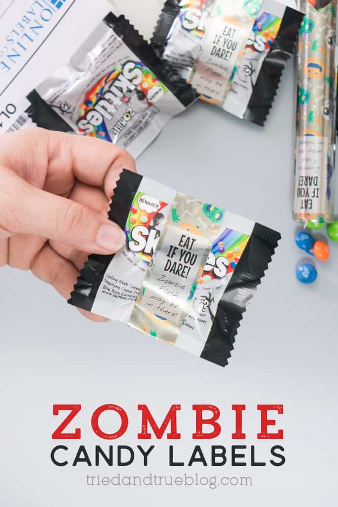Hand holding a bag of Zombie Skittles in front of other bags. Each has Zombie Skittles Candy Labels on them.