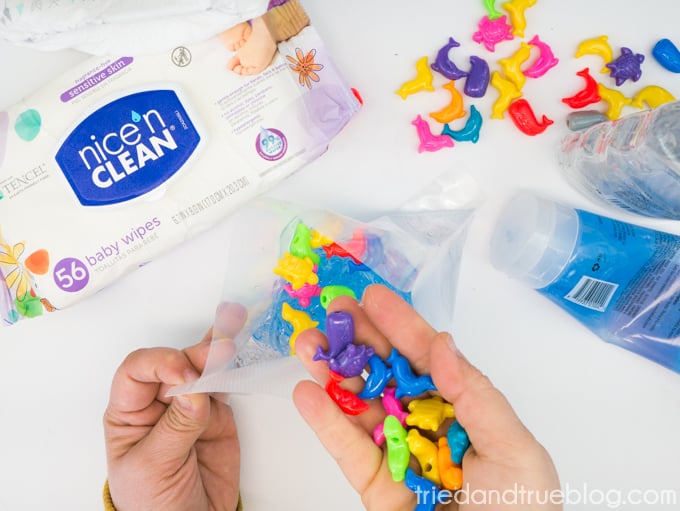 Add beads to plastic bag.