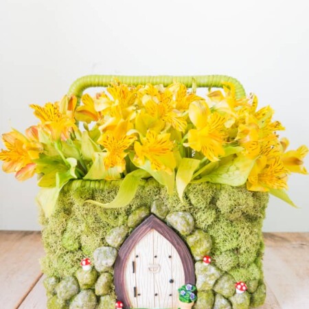 Transform a simple basket into this adorable Spring Fairy Garden Basket! Perfect for spring flowers and so much more!