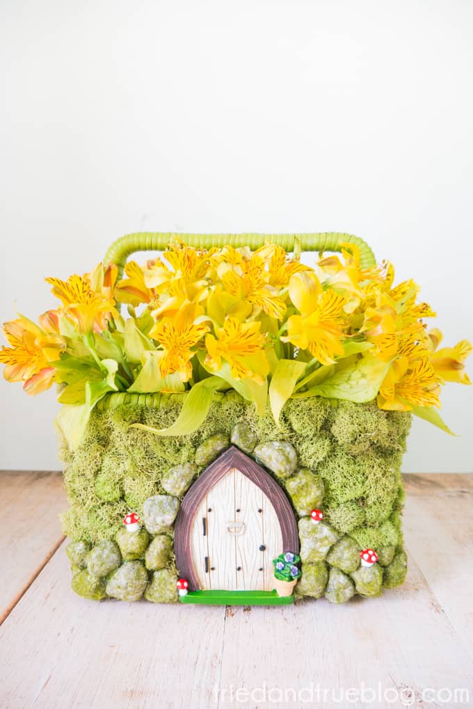 Transform a simple basket into this adorable Spring Fairy Garden Basket! Perfect for spring flowers and so much more!