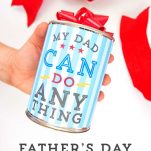 Hand holding the Father's Day Gift Can