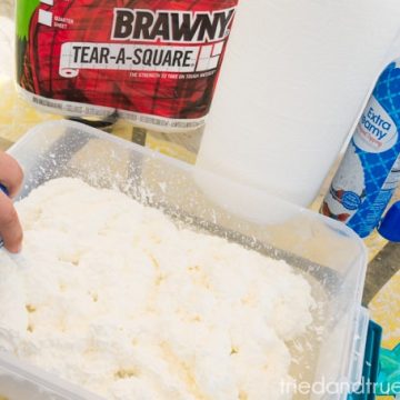 Adding the whipped cream to a large bucket