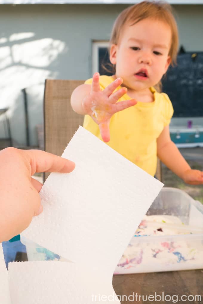 Toddler grabbing for small paper towel