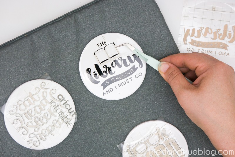 Removing transfer paper with tweezers
