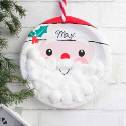 Super easy Christmas Countdown made with santa plate and cotton balls.