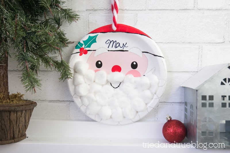 Christmas Countdown for kids made with santa plate and cotton balls.