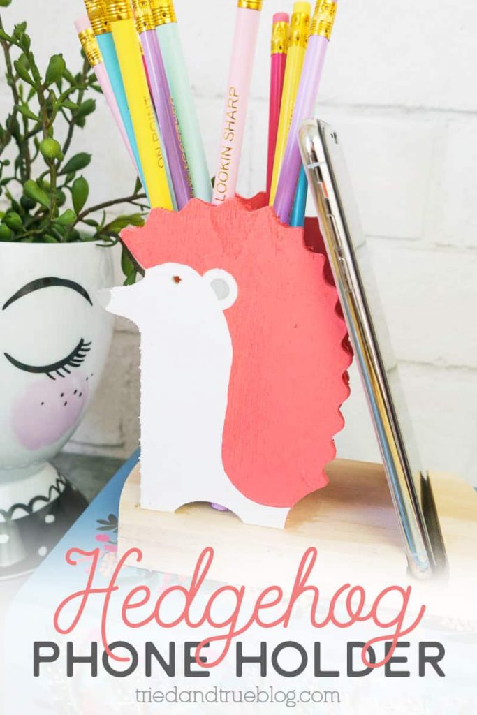 Pink and white Hedgehog Cell Phone Holder with pencils.