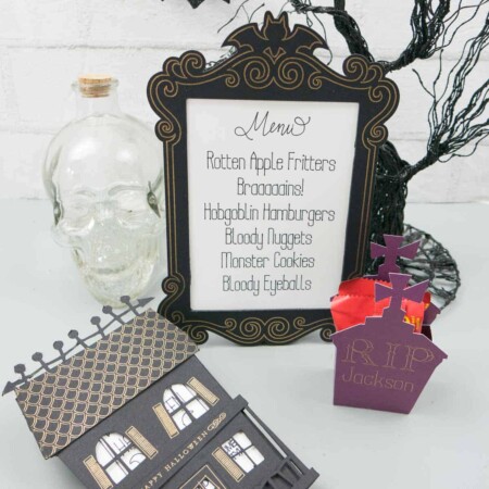 Three Halloween projects made with Cricut Foil Kit: haunted house invite, menu frame, and gravestone placeholder/favor