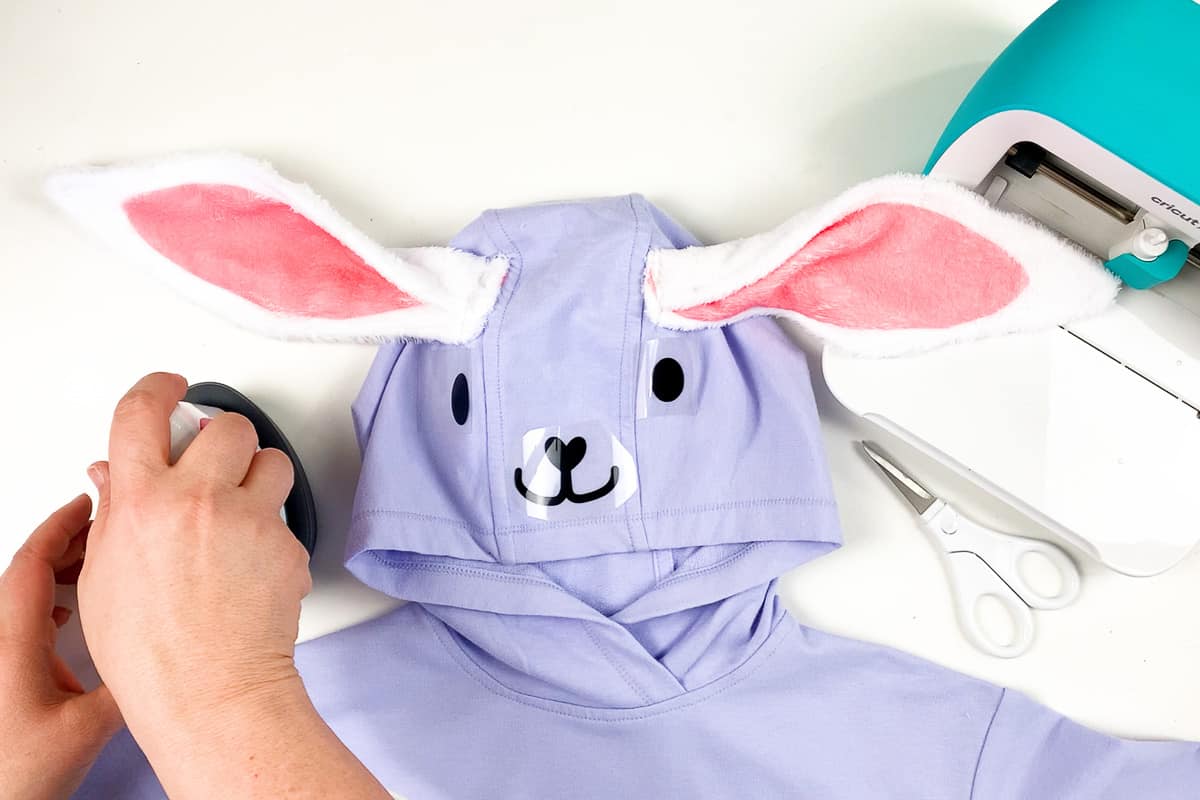 Applying bunny face to the hoodie.
