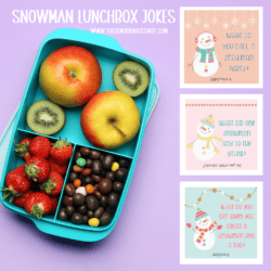 A lunch box with fruit and candy.
