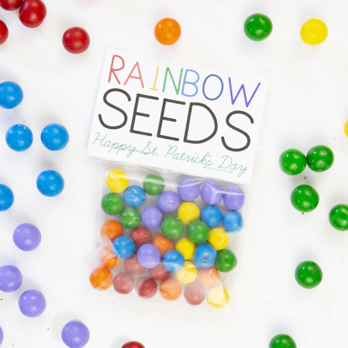 A bag of rainbow seeds on a white background with the St. Patrick's Day Free Printable Label.